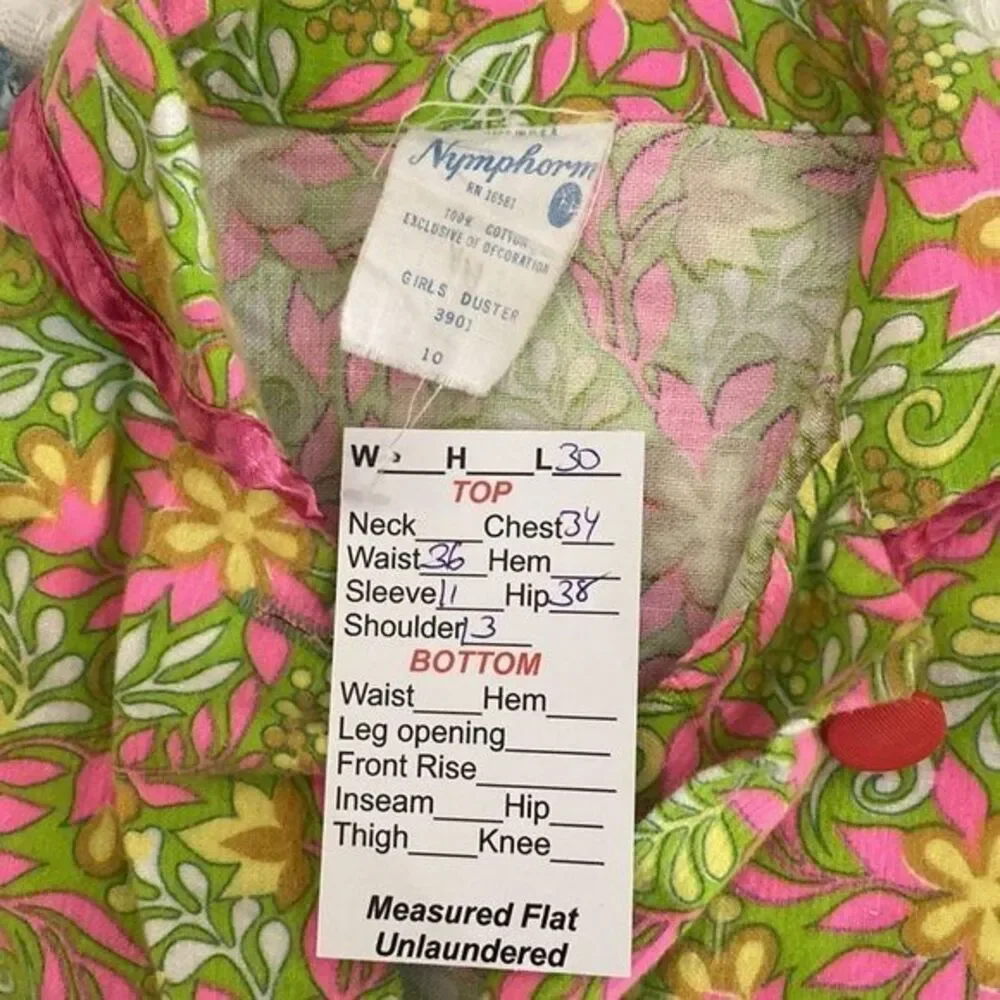 1970’s pink girls robe with short sleeve 30” length. 34” chest  120